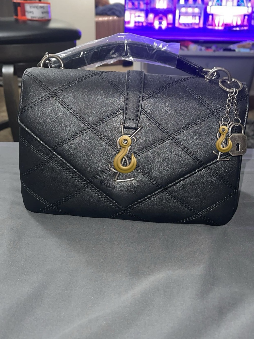 Women's Black Quilted Top-Handle Bag with silver Hardware